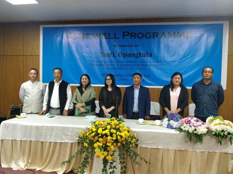 Department of Planning and Coordination officials during the farewell programme held for its Joint Development Commissioner, Opangtula at Hotel Japfü, Kohima on September 30.