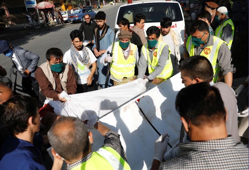 Afghan men carry an injured to a hospital after a blast in Kabul, Afghanistan on September 9, 2020. (REUTERS Photo)