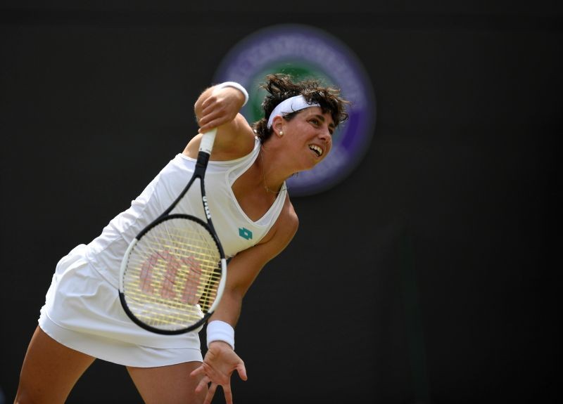 FILE PHOTO: Spain's Carla Suarez Navarro in action during her fourth round match against Serena Williams of the U.S. REUTERS/Tony O'Brien/File Photo