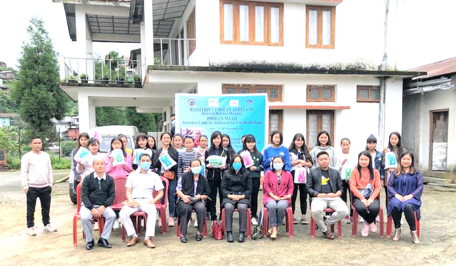 Officials and participants during the awareness camp for adolescent girls on health issue held at DUDU Hall, Longkhim on September 24.