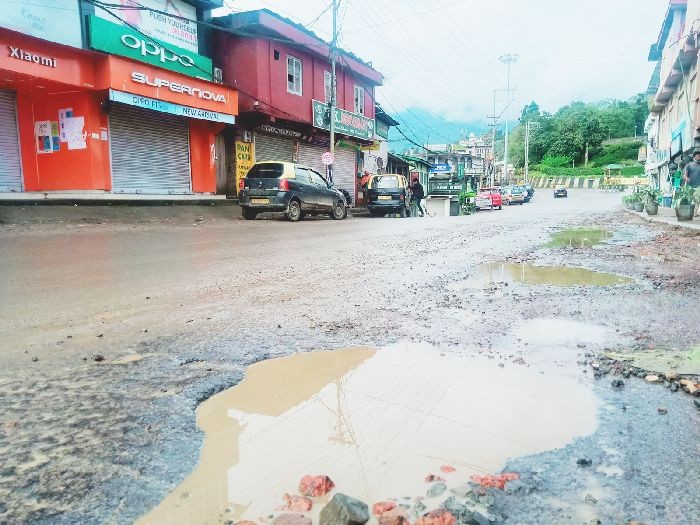 Multiple potholes along the normally busy street  near TCP gate in the state capital Kohima on September 27. (Morung Photo by Chizokho Vero)