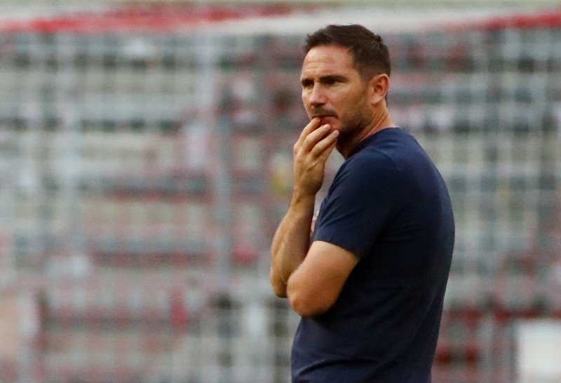 Soccer Football - Champions League - Round of 16 Second Leg - Bayern Munich v Chelsea - Allianz Arena, Munich, Germany - August 8, 2020 Chelsea manager Frank Lampard on the pitch before the match, as play resumes behind closed doors following the outbreak of the coronavirus disease (COVID-19) REUTERS/Michael Dalder/Files