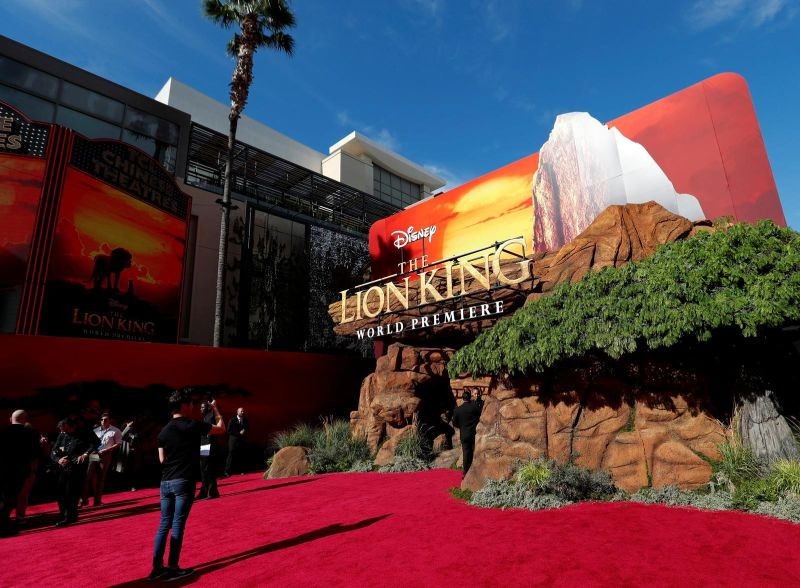 FILE PHOTO: A person takes pictures ahead of the World Premiere of "The Lion King" in Los Angeles, California, US, July 9, 2019. (Reuters File Photo)