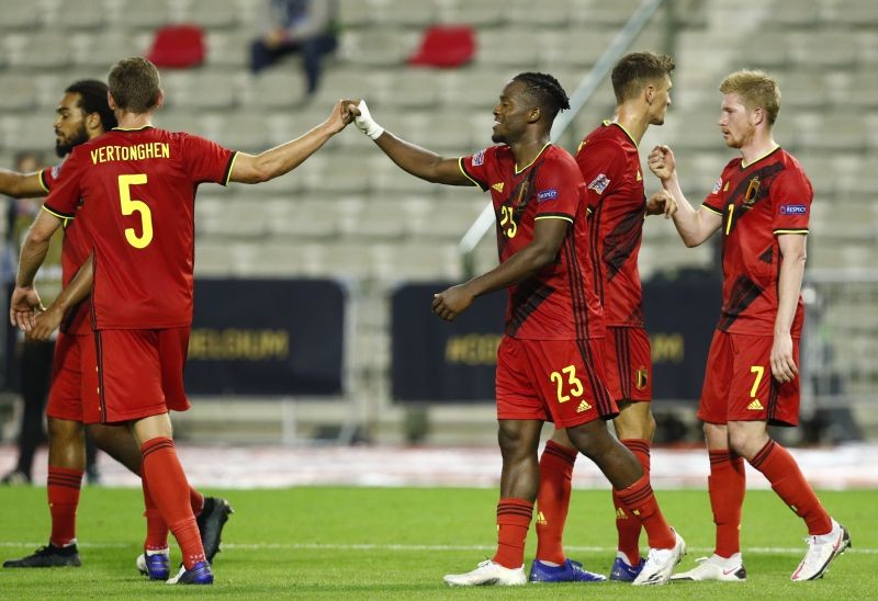 Belgium's Michy Batshuayi celebrates scoring their fourth goal with teammates REUTERS/Francois Lenoir