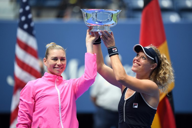 (L-R) Vera Zvonareva of Russia and Laura Siegemund of Germany hold the championship trophy after their match against Yifan Xu of China and Nicole Melichar of the United States (both not pictured) in the women's doubles final on day eleven of the 2020 U.S. Open tennis tournament at USTA Billie Jean King National Tennis Center. Danielle Parhizkaran-USA TODAY Sports