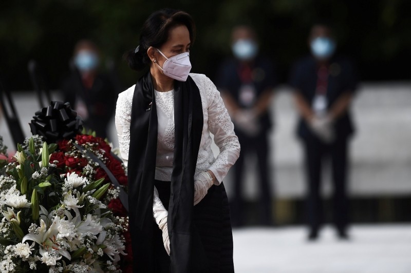 FILE PHOTO: Myanmar State Counsellor and Foreign Minister Aung San Suu Kyi leaves after paying her respects to her late father during a ceremony to mark the 73rd anniversary of Martyrs' Day in Yangon on July 19, 2020. Ye Aung Thu/Pool via REUTERS/File Photo