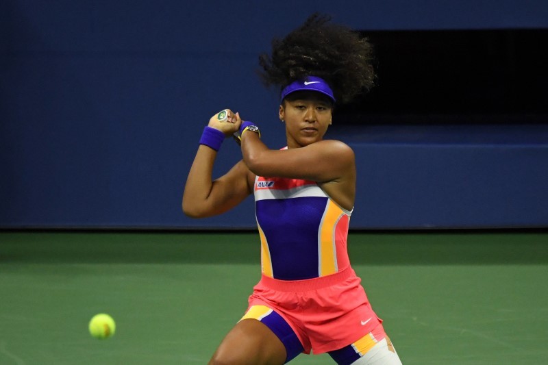 Naomi Osaka of Japan hits a backhand against Jennifer Brady of the United States (not pictured) in a women's singles semi-finals match on day ten of the 2020 U.S. Open tennis tournament at USTA Billie Jean King National Tennis Center. Mandatory Credit: Danielle Parhizkaran-USA TODAY Sports