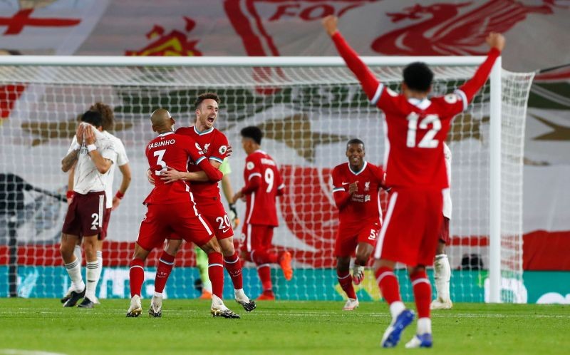 Liverpool's Diogo Jota celebrates scoring their third goal with teammates Pool via REUTERS/Jason Cairnduff
