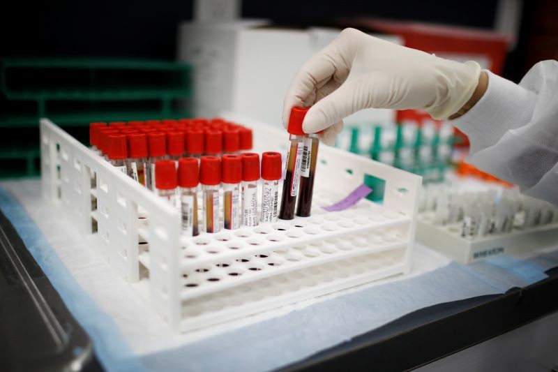 REPRESENTATIVE IMAGE: A health worker takes test tubes with plasma and blood samples after a separation process in a centrifuge during a coronavirus disease (COVID-19) vaccination study at the Research Centers of America, in Hollywood, Florida, U.S., September 24, 2020. (REUTERS File Photo)