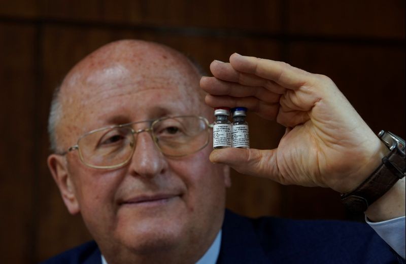 Alexander Gintsburg, director of the Gamaleya National Research Center for Epidemiology and Microbiology, shows bottles with Sputnik-V vaccine against the coronavirus disease (COVID-19) during an interview with Reuters in Moscow, Russia on September 24, 2020. (REUTERS Photo)