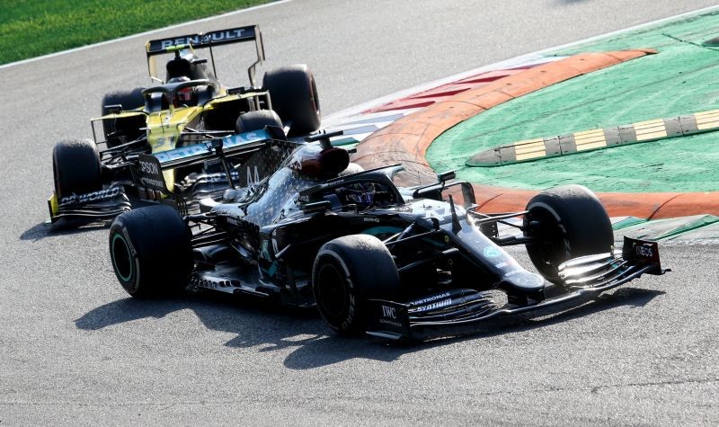 Mercedes' Lewis Hamilton and Renault's Esteban Ocon during the race Pool via REUTERS/Matteo Bazzi