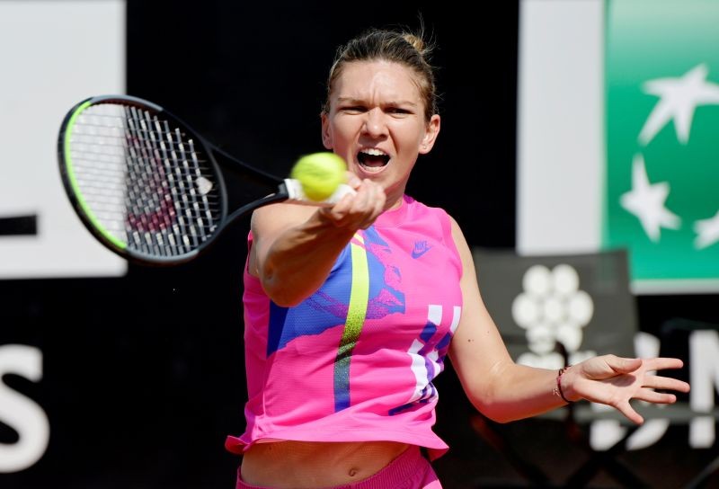 Romania's Simona Halep in action during her second round match against Italy's Jasmine Paolini on September 16. Pool via REUTERS/Riccardo Antimiani