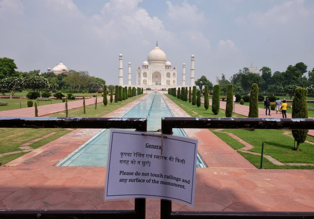 A notice is tied to a railing inside the premises of Taj Mahal after authorities reopened the monument for visitors, amidst the coronavirus disease (COVID-19) outbreak, in Agra, India, September 21, 2020. (REUTERS/Alasdair Pal)