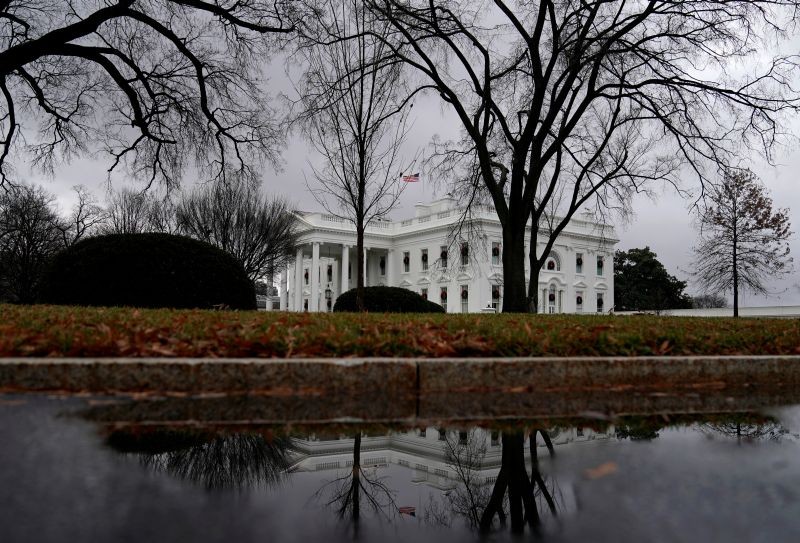 The White House is reflected in a puddle in Washington, U.S., December 21, 2018. (REUTERS File Photo)