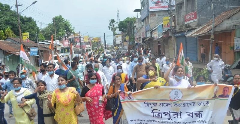 Protestors carrying a banner during the 12 hour shutdown called by the Congress in Tripura on September 21. (IANS Photo)
