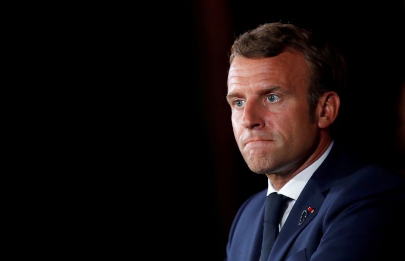 French President Emmanuel Macron looks on as he attends a news conference at the Pine Residence, the official residence of the French ambassador to Lebanon, in Beirut, Lebanon on September 1, 2020. (REUTERS File Photo)