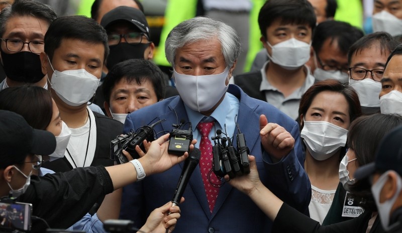 Rev. Jun Kwang-hoon, who is the head of the Sarang Jeil Church in Seoul, which is at the center of the new wave of infections, speaks to the media before being imprisoned in front of his church in Seoul, South Korea, September 7, 2020. Picture taken on September 7, 2020. Yonhap via REUTERS/Files