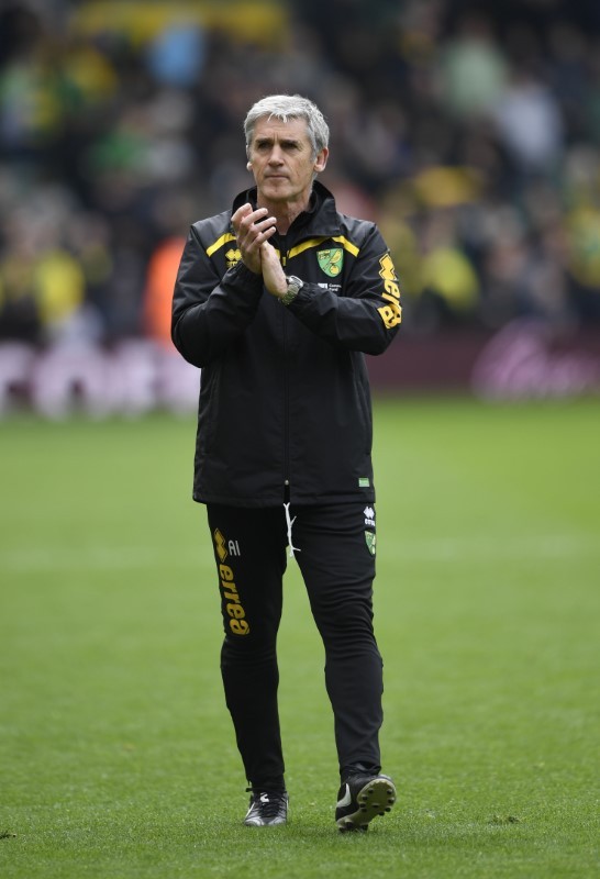 Norwich caretaker manager Alan Irvine applauds fans after the match Mandatory Credit: Action Images / Tony O'Brien Livepic