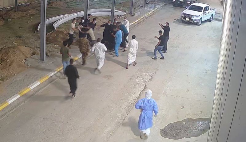 Relatives of a patient, who died from the coronavirus disease (COVID-19), beat up Tarik Sheibani, 47, an Iraqi doctor and director of Al-Amal Hospital, in this still image taken from CCTV footage obtained by Reuters, in Najaf, Iraq August 27, 2020. (REUTERS File Photo)
