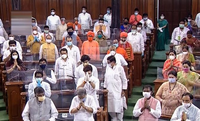 MPs pay tribute to ex-President Pranab Mukherjee, legendary Indian classical vocalist Pandit Jasraj and others who passed away this year, during the opening day of Parliament's monsoon session amid the ongoing coronavirus pandemic at Parliament House in New Delhi.