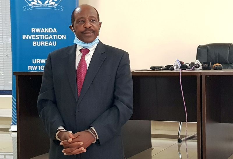 Paul Rusesabagina, the man who was hailed a hero in a Hollywood movie about the country's 1994 genocide is detained and paraded in front of media in handcuffs at the headquarters of Rwanda Investigation Bureau in Kigali, Rwanda on August 31, 2020. (REUTERS File Photo)