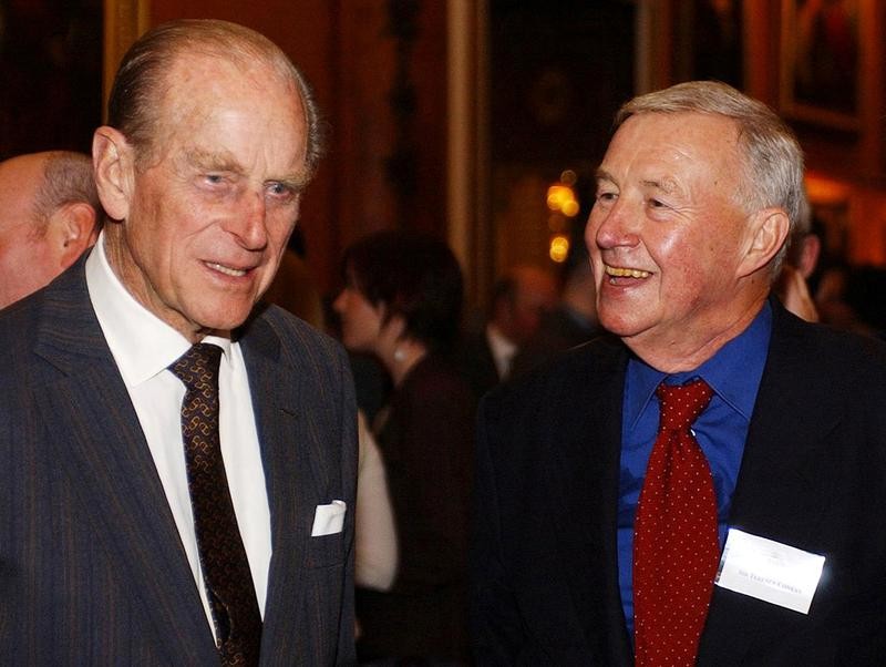 FILE PHOTO: Britain's Duke of Edinburgh (L) meets designer and restaurateur Britain's Sir Terence Conran during a design reception at Buckingham Palace, London November 22, 2004, to mark the contribution made by the British design industry. REUTERS/Kirsty Wigglesworth/PA/Pool/File Photo