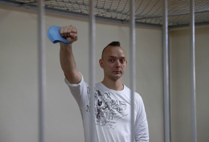 Ivan Safronov, a former journalist and an aide to the head of Russia's space agency Roscosmos who remains in custody on state treason charges, gestures inside a defendants' cage as he attends a court hearing in Moscow, Russia on September 2, 2020. (REUTERS Photo)