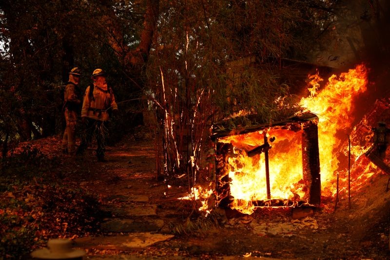 A structure is seen engulfed in flames during the Glass Fire in Calistoga, California, US on September 27, 2020. (REUTERS Photo)