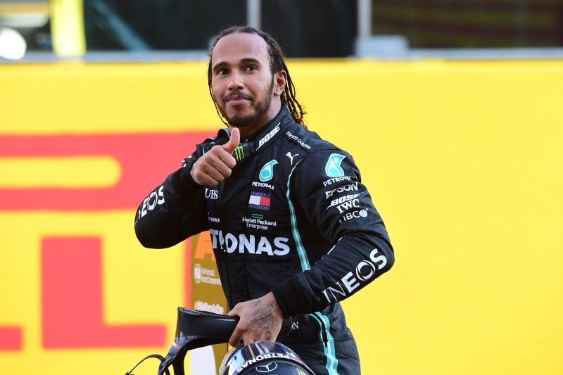 Formula One F1 - Tuscan Grand Prix - Mugello, Scarperia e San Piero, Italy - September 13, 2020 Mercedes' Lewis Hamilton celebrates after winning the race Pool via REUTERS/Jennifer Lorenzini