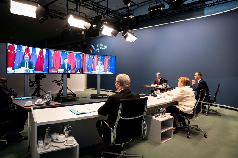 A government handout shows German Chancellor Angela Merkel during a video conference with European Council President Charles Michel, European Commission President Ursula von der Leyen and China's President Xi Jinping, at the Chancellery in Berlin, Germany on September 14. (REUTERS Photo)