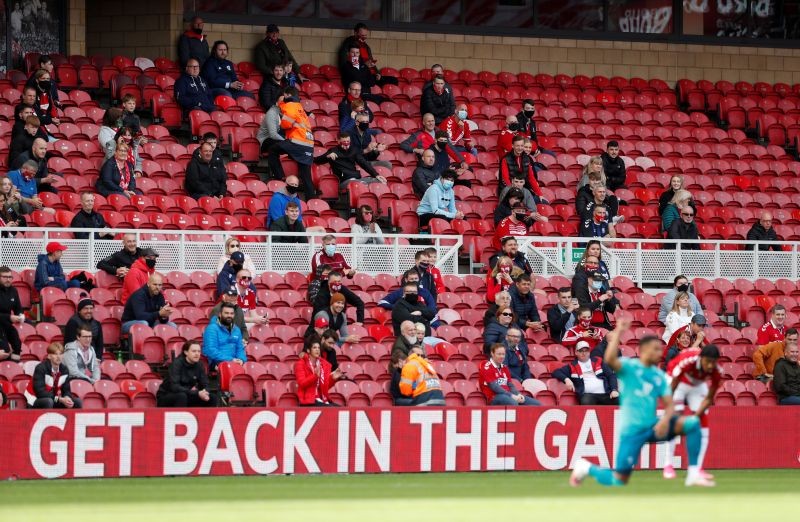 Middlesbrough fans look on as players kneel before the match as a limited number of fans are allowed to attend. Action Images via Reuters/Lee Smith/File Photo