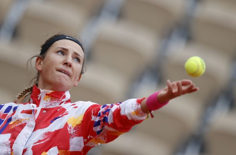 Belarus' Victoria Azarenka in action during her first round match against Montenegro's Danka Kovinic. REUTERS/Christian Hartmann