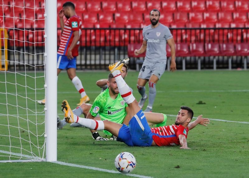 Granada's Fede Vico in action REUTERS/Jon Nazca