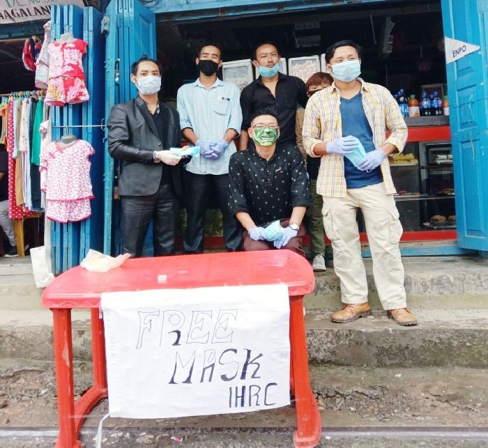 Yemlong Chaba with IHRC Tuensang dist team during free distribution of mask