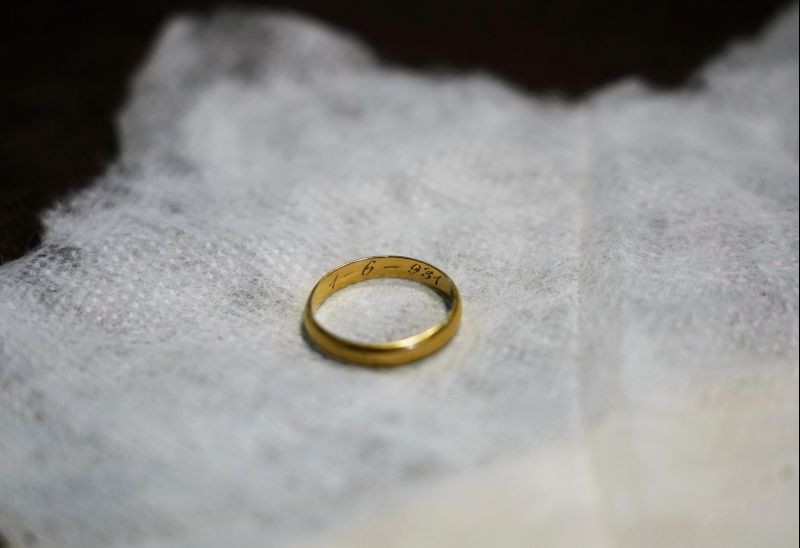 The wedding ring of Eugenio Insua is seen during the exhumation of a mass grave by the Association for the Recovery of Historical Memory (ARMH), Insua is one of the 17 people who were killed by the forces of dictator Francisco Franco in July 1936 at the El Espinar cemetery, in El Espinar, Spain on September 10, 2020. Picture taken September 10, 2020. (REUTERS File Photo)