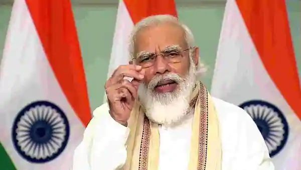 PM Modi again mounted a strong defence of the measures, saying farmers will now have the freedom to sell their produce at a place and price of their choice. (Photo: ANI)