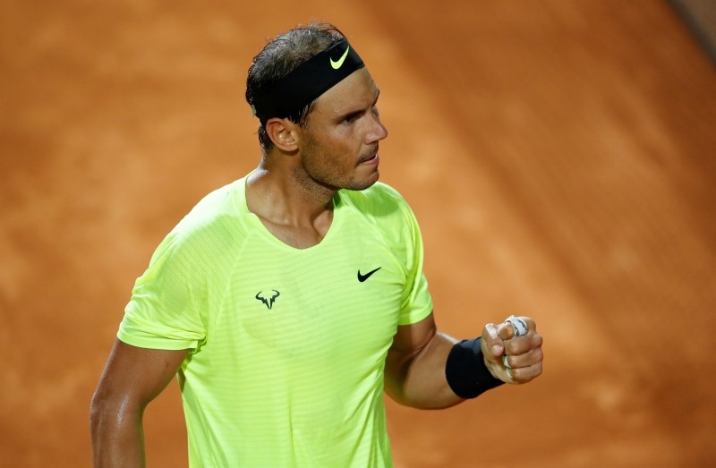 FILE PHOTO: Tennis - ATP Masters 1000 - Italian Open - Foro Italico, Rome, Italy - September 19, 2020 Spain's Rafael Nadal reacts during his quarter final match against Argentina's Diego Schwartzman Pool via REUTERS/Clive Brunskill/File Photo