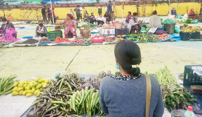 Vendors under the banner of SEWA Kohima sell local vegetables at Kohima Local Ground on September 11. (Morung Photo)