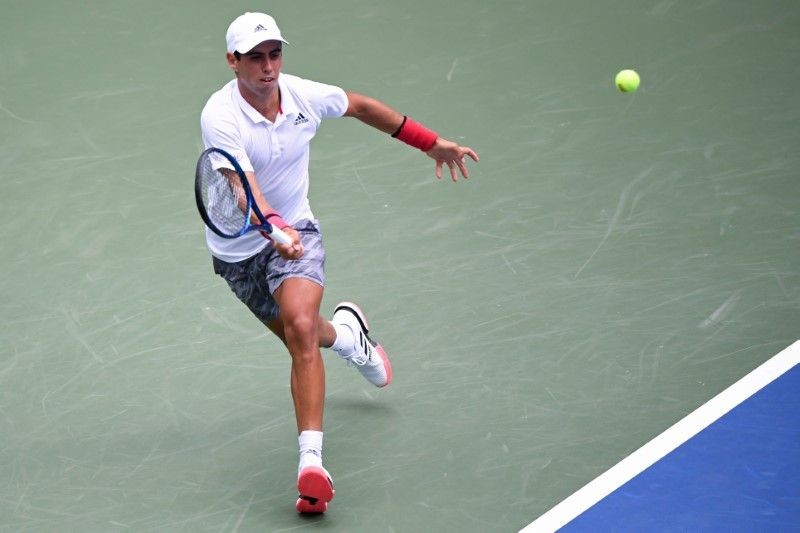 Jaume Munar of Spain hits a forehand against Dominic Thiem of Austria (not pictured) on day two of the 2020 U.S. Open tennis tournament at USTA Billie Jean King National Tennis Center. Danielle Parhizkaran-USA TODAY Sports