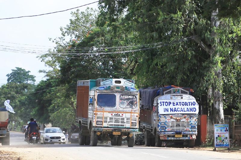 A Dimapur-bound truck, bearing a protest banner, parked on the side of NH 29 in Lahorijan on September 29 during the indefinite chakka jam called by truckers. (Morung Photo by Soreishim Mahong)