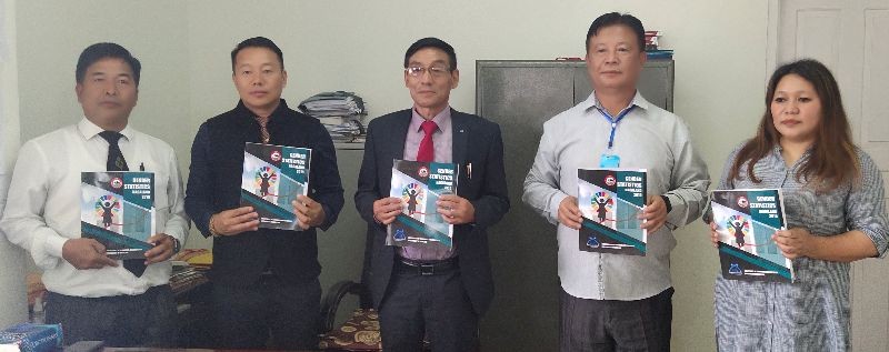 Outgoing DES Director Y Sacheo Ovung (middle) and incoming Director R Kronu (2nd from right) with other officers pose for the lens with the just released Gender Statistics Nagaland at Directorate of Economic & Statistics.