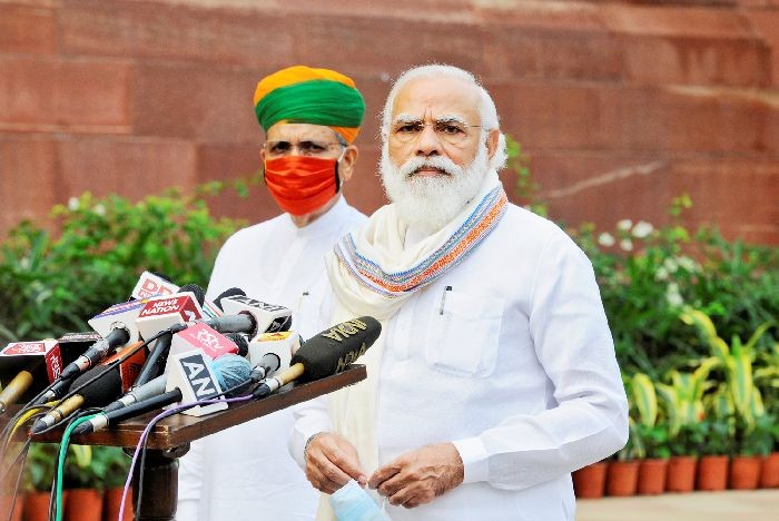 India's Prime Minister Narendra Modi looks on as he speaks to the media inside the parliament premises on the first day of the monsoon session in New Delhi on September 14. (REUTERS Photo)