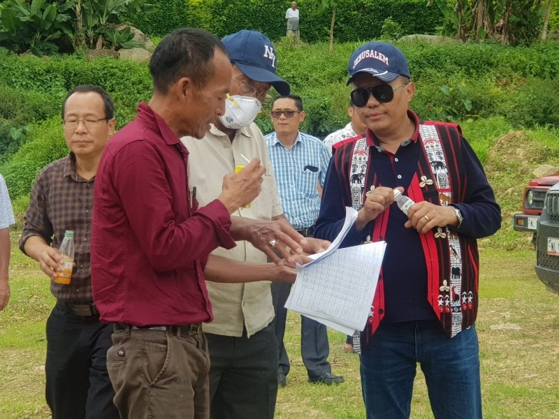 Officials and contractor briefing about the ongoing works to APC Y Kikheto Sema, IAS at Kumbani Stadium, Mangkolemba during inspection of NEC projects under Mokokchung district on September 16. (Morung Photo)