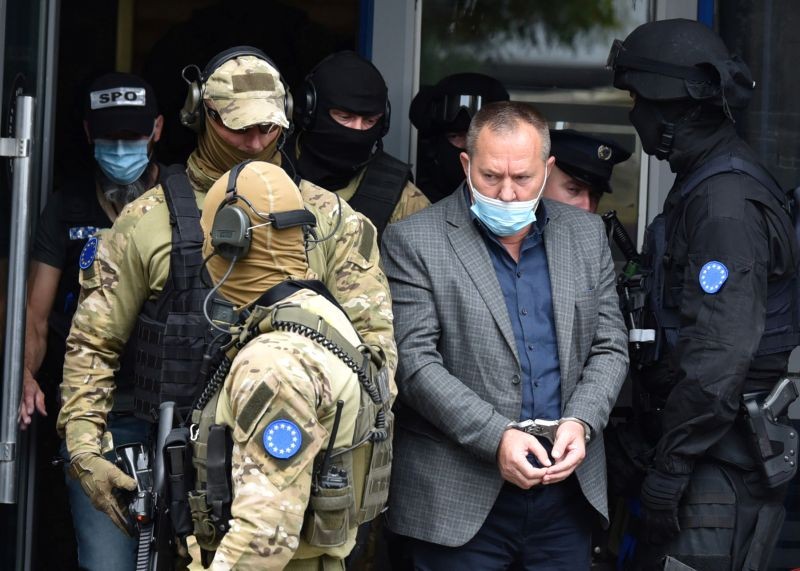 Special police units from the European Union rule-of-law mission, EULEX, arrest the leader of Kosovo Liberation Army War Veterans Organisation, Hysni Gucati, during a raid on the organisation's offices in Pristina, Kosovo on September 25. (REUTERS Photo)