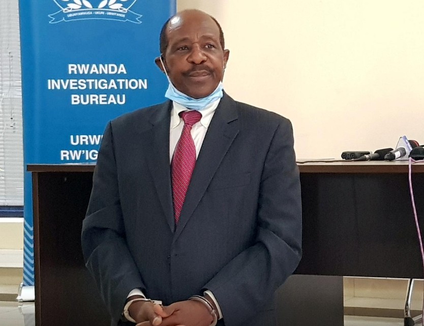 FILE PHOTO: Paul Rusesabagina, the man who was hailed a hero in a Hollywood movie about the country's 1994 genocide is detained and paraded in front of media in handcuffs at the headquarters of Rwanda Investigation Bureau in Kigali, Rwanda August 31, 2020. REUTERS/Clement Uwiringiyimana/File Photo
