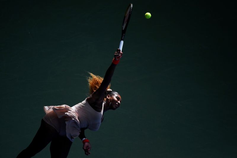 Serena Williams of the United States serves against Maria Sakkari of Greece (not pictured) on day eight of the 2020 U.S. Open tennis tournament at USTA Billie Jean King National Tennis Center. Danielle Parhizkaran-USA TODAY Sports