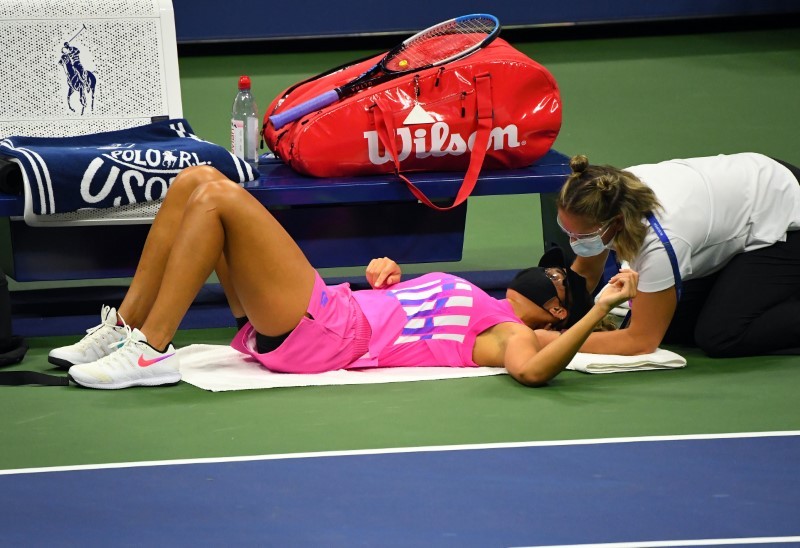 Madison Keys of the United States receives treatment from an ATP trainer during a timeout against Alize Cornet of France on day six of the 2020 U.S. Open tennis tournament at USTA Billie Jean King National Tennis Center. Robert Deutsch-USA TODAY Sports