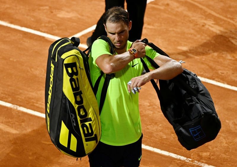 Spain's Rafael Nadal walks off after losing his quarter final match against Argentina's Diego Schwartzman Pool via REUTERS/Clive Brunskill