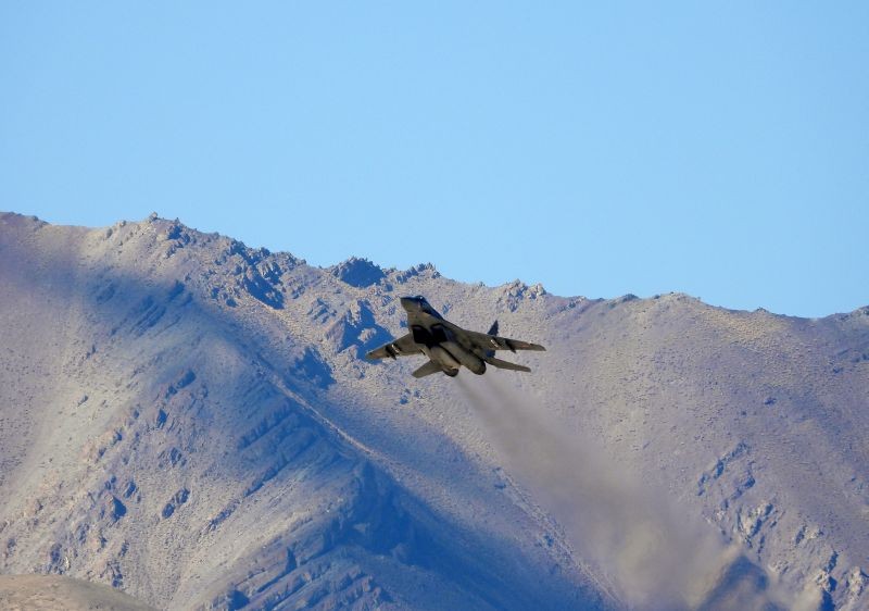 An Indian fighter plane flies over a mountain range in Leh, in the Ladakh region on September 9, 2020. (REUTERS Photo)