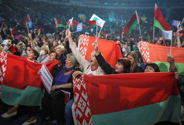Supporters of Belarusian President Alexander Lukashenko cheer as they attend the forum of Union of Women in Minsk, Belarus September 17, 2020. (REUTERS Photo)